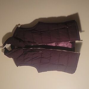Calvin Klein women's plum shell vest. 100%polyester. Size S. Never worn.